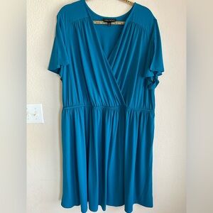 NWOT Elegant Plus size 26/28 Lane Bryant dress, with 2 pockets and Pterol color.